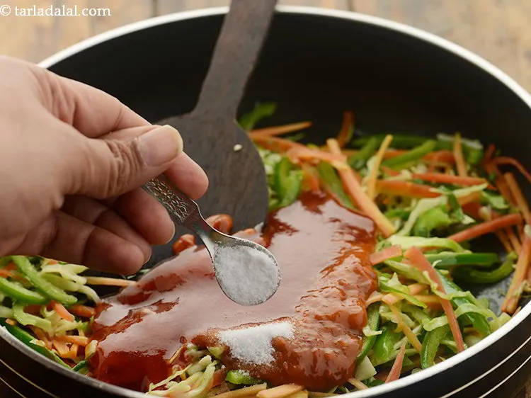 Step 14 – Add salt. Fried noodles, ketchup, schezuan sauce already consists of a little salt so add …