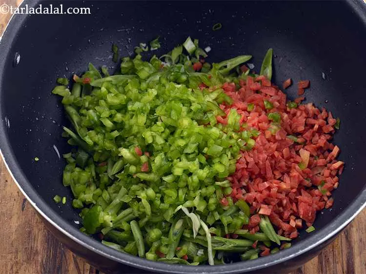 Step 22 – Add the chopped capsicum.