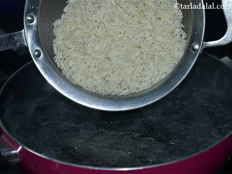 Step 7 – Add the rice to the boiling water and mix well.