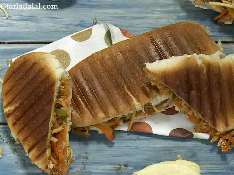 Step 21 – Cut each panini diagonally into 2 equal pieces.