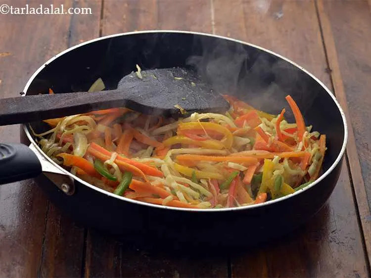 Step 4 – Add the capsicum and salt, mix well and cook on a high flame for 2 …