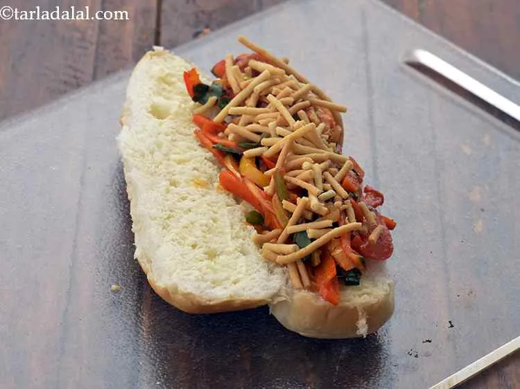 Step 15 – Finally sprinkle 1 tbsp of fried noodles evenly over it.&nbsp; Crispy fried noodles add a …