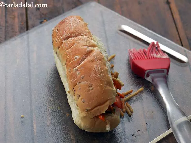 Step 17 – Apply ? tsp of butter on top.