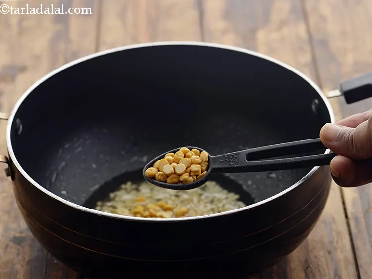 Step 12 – Add chana dal.