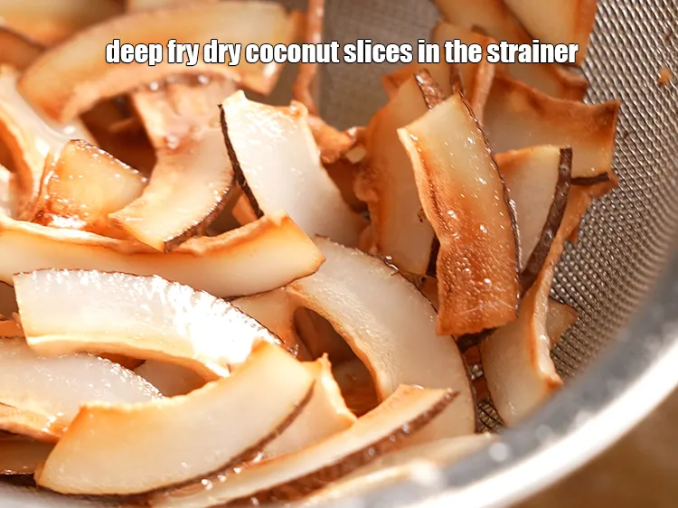 Step 12 – Repeat the strainer method of step 1 to deep-fry&nbsp;1/2 cup&nbsp;<a href="https://www.tarladalal.com/glossary-sliced-dry-coconut-2273i">dry coconut (kopra) slices</a>&nbsp;and&nbsp;deep-fry them&nbsp;till …