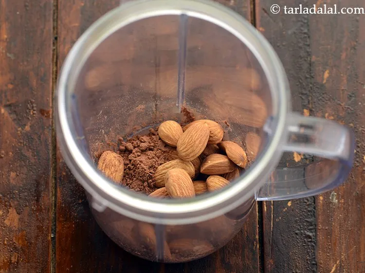 Step 3 – Add the almonds. To know <a href="https://www.tarladalal.com/glossary-almonds-378i" target="_blank">more about almonds</a> click here. See the <a …