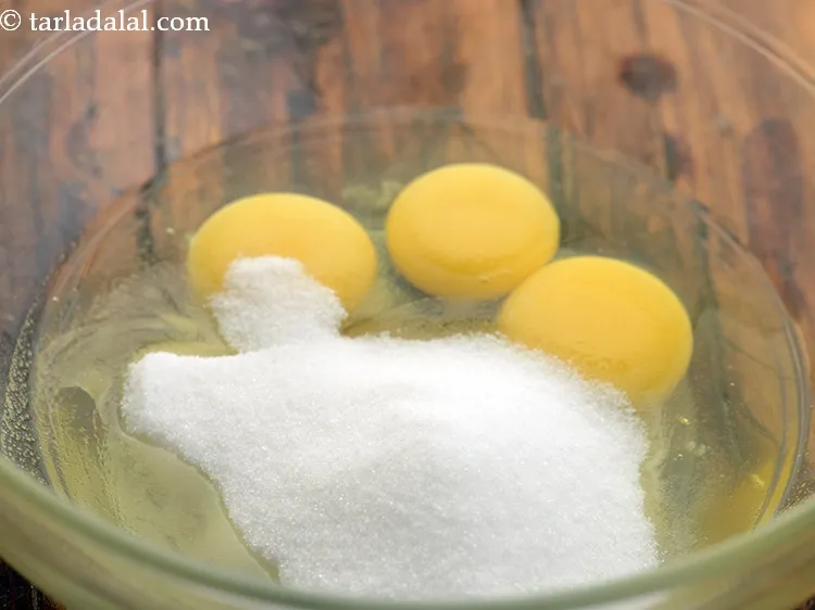 Step 40 – Add 1 1/2 cups&nbsp;<a href="https://www.tarladalal.com/glossary-castor-sugar-279i">castor sugar</a>&nbsp;to it.&nbsp;