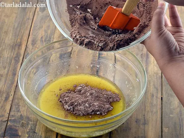 Step 15 – Likewise add half the flour mixture to the bowl.