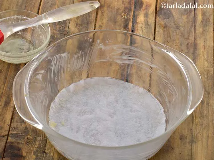 Step 20 – Line it with a piece of greaseproof paper at the bottom of the dish and …