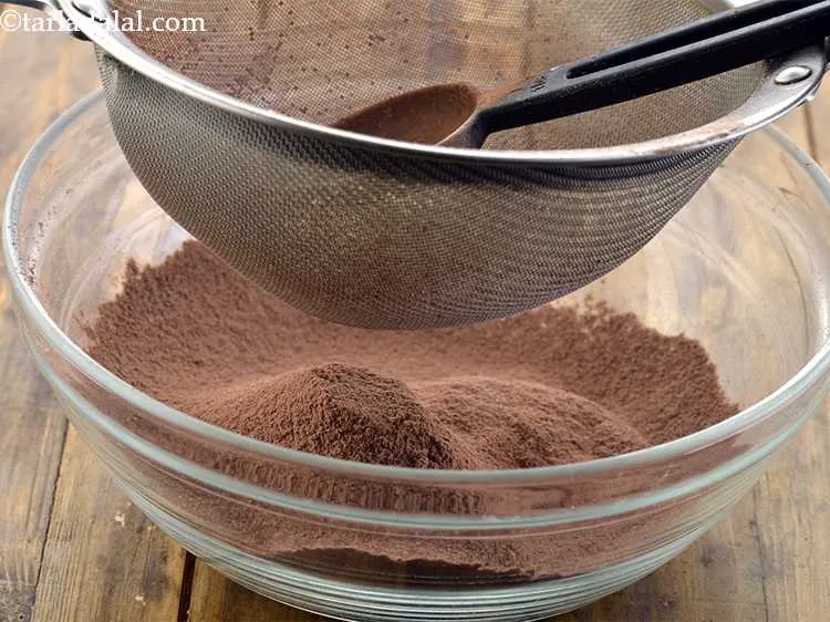 Step 4 – Sift together the flour and cocoa powder. This will remove the lumps or impurities from …