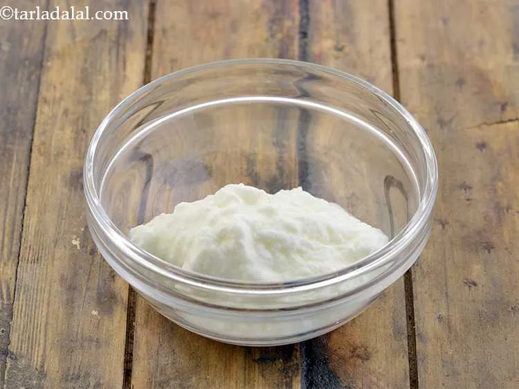 Step 5 – Take sour curd in another small bowl.