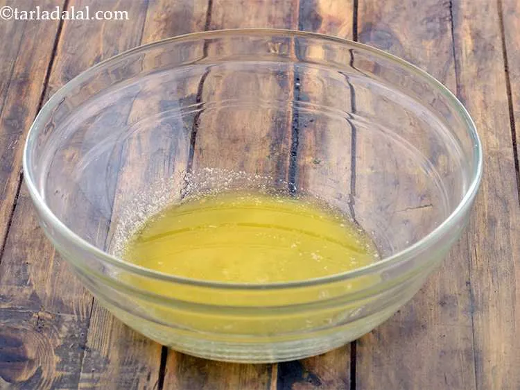 Step 8 – Take another medium sized bowl and put the melted butter into it.