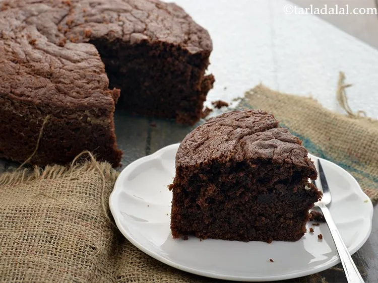 Step 17 – You can cut this&nbsp;<strong>Eggless Chocolate cake using curds</strong>&nbsp;into pieces &amp; enjoy it with your friends …