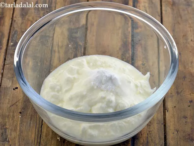 Step 3 – Combine the curds and soda bi-carb in a bowl and keep aside. This mixture becomes …