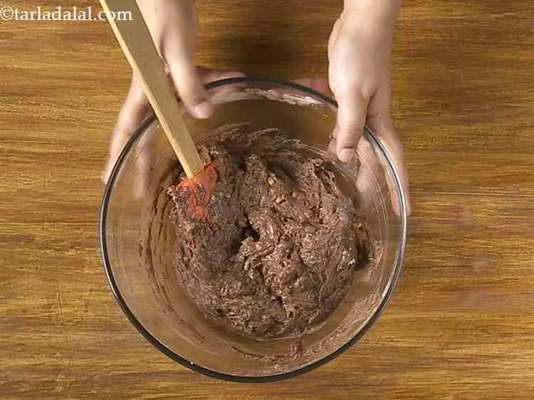 Step 18 – Mix well with the help of a spatula. Do not over mix to prevent the …