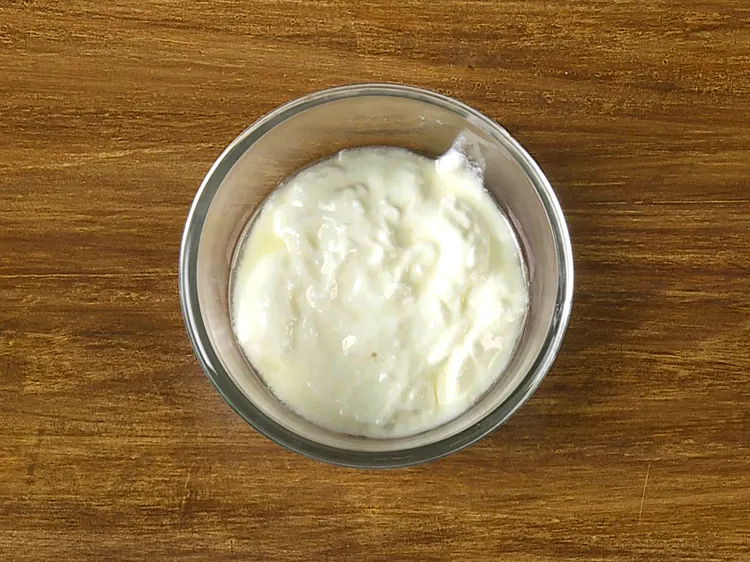 Step 4 – To make the batter of the <strong>Chocolate Fudge Cake</strong>, first take a small bowl and …