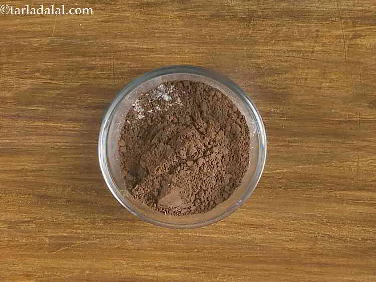 Step 23 – Now, add the cocoa powder.