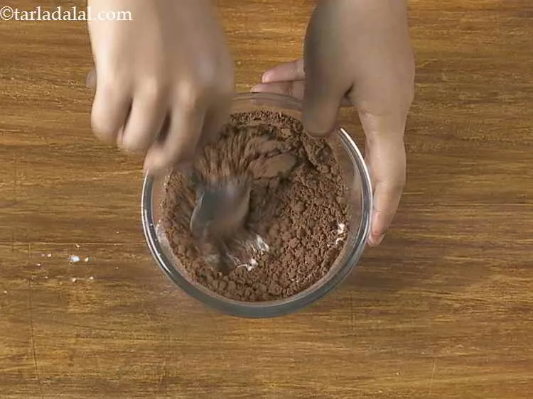 Step 25 – Mix well with the help of a spoon till no lumps remain and a thick …