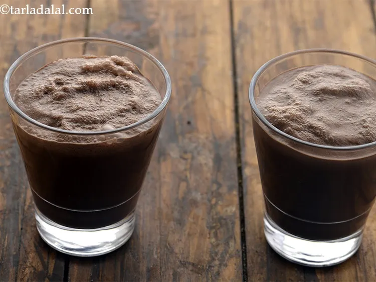 Step 12 – Pour <strong>chocolate milkshake for kids and adult</strong>s into 2 individual glasses. To make the glasses …