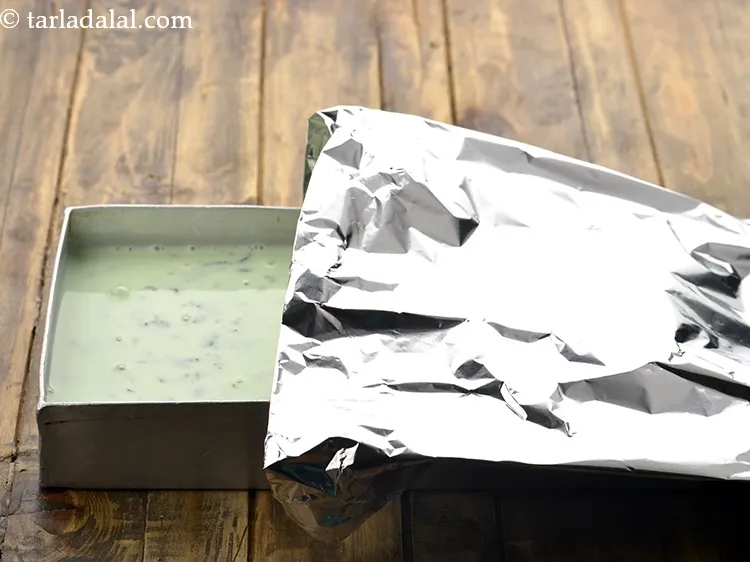 Step 23 – Cover with an aluminium foil and freeze for 6 hours or till semi-set. Ensure the …