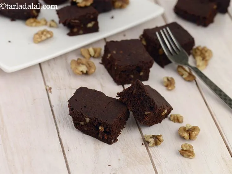 Step 11 – Remove and discard the grease proof paper and cut them into squares. This recipe makes …