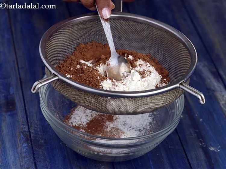 Step 3 – Sift together the ? cup of flour and 2 tbsp of cocoa powder using a …
