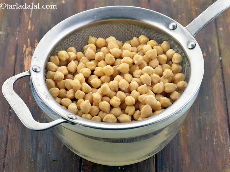 Step 3 – This is how the kabuli chana looks after being soaked. Drain well.