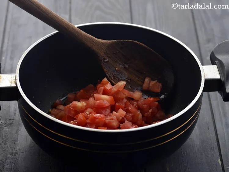 Step 15 – Add the tomatoes. To make it quickly, make use of tomato pulp instead.
