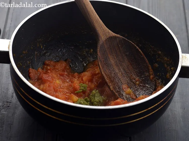 Step 17 – Add the <a href="https://www.tarladalal.com/How-To-Make-Green-Chilli-Paste-42729r" target="_blank">green chilli paste</a>. I prepare the paste using this recipe of …
