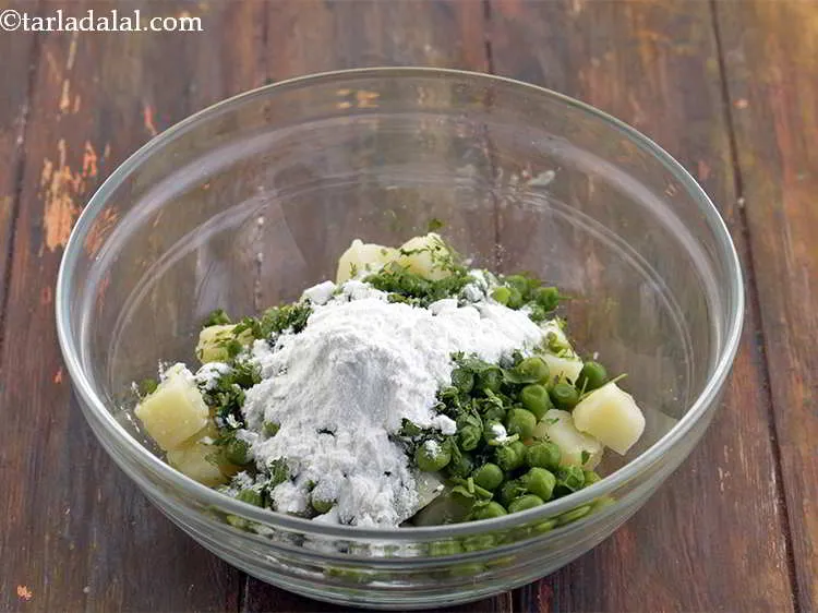 Step 30 – Now, add the cornflour. This will help bind the mixture well.