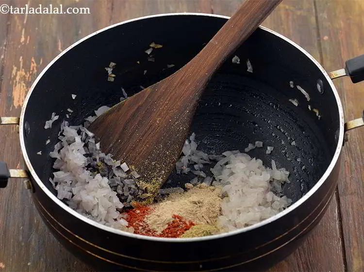 Step 12 – Also add the dried mango powder or Amchur. This will give a nice tangy taste …