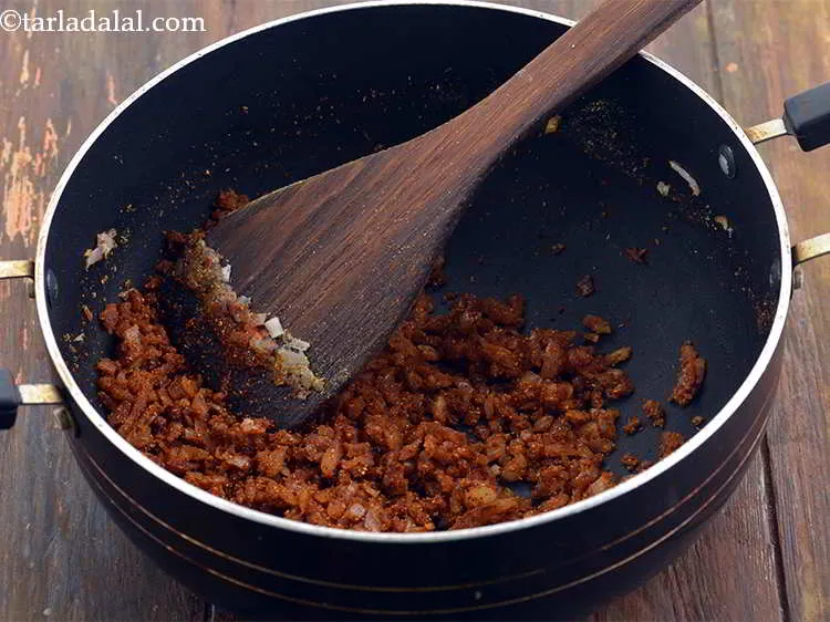 Step 14 – Mix well and cook for 30 seconds till the masalas are roasted.