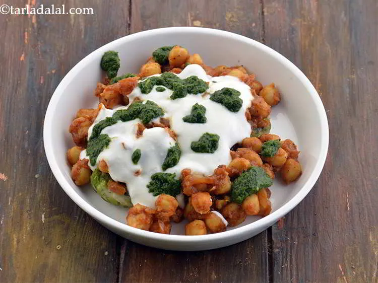 Step 45 – Also spread 1&frac12; tsp green chutney. <a href="https://www.tarladalal.com/Green-Chutney-How-To-Make-Green-Chutney-Recipe-22266r">You can buy readymade green chutney or make …