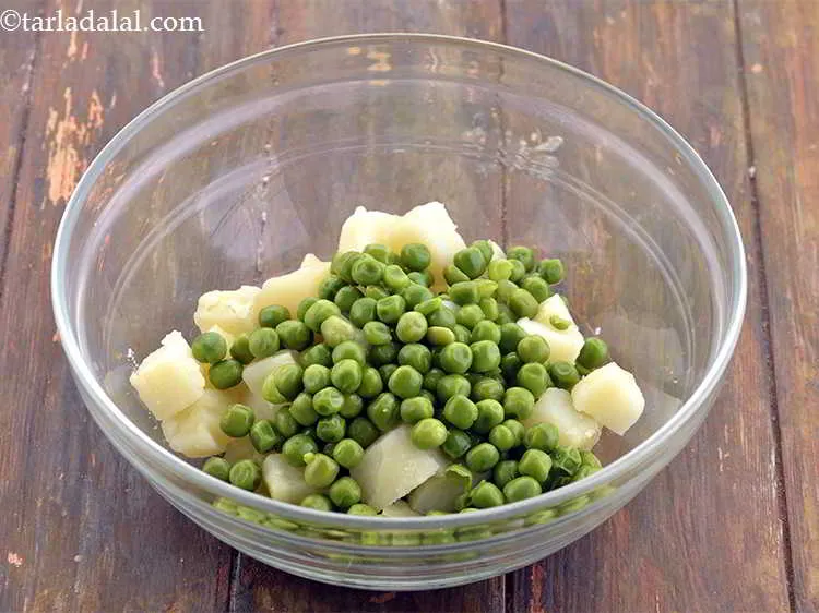 Step 28 – Add the boiled green peas as well.