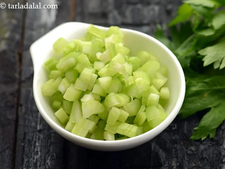 Step 13 – Add 2 tbsp&nbsp;finely&nbsp;<a href="https://www.tarladalal.com/glossary-chopped-celery-799i">chopped celery</a>&nbsp;(ajmoda)