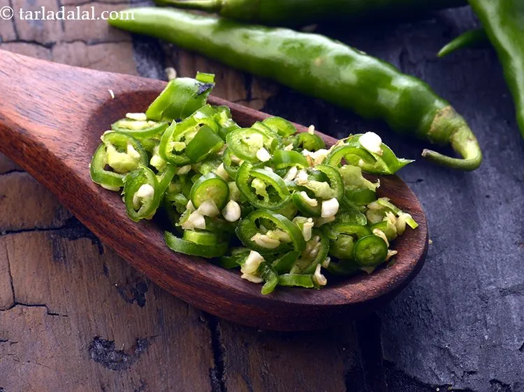 Step 35 – Add 1/2 tsp&nbsp;finely&nbsp;<a href="https://www.tarladalal.com/glossary-chopped-green-chilli-820i">chopped green chillies</a>.