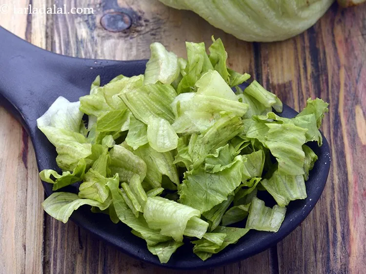 Step 11 – Add 1 cup&nbsp;<a href="https://www.tarladalal.com/glossary-iceberg-lettuce-iceberg-salad-ke-patte-499i">iceberg lettuce</a>&nbsp;, torn into pieces.&nbsp;