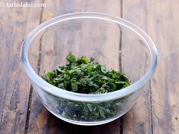 Step 6 – Chop the leaves. We will need 1/4 cup&nbsp;<a href="https://www.tarladalal.com/glossary-chopped-mint-788i">chopped mint leaves (phudina)</a>.&nbsp;