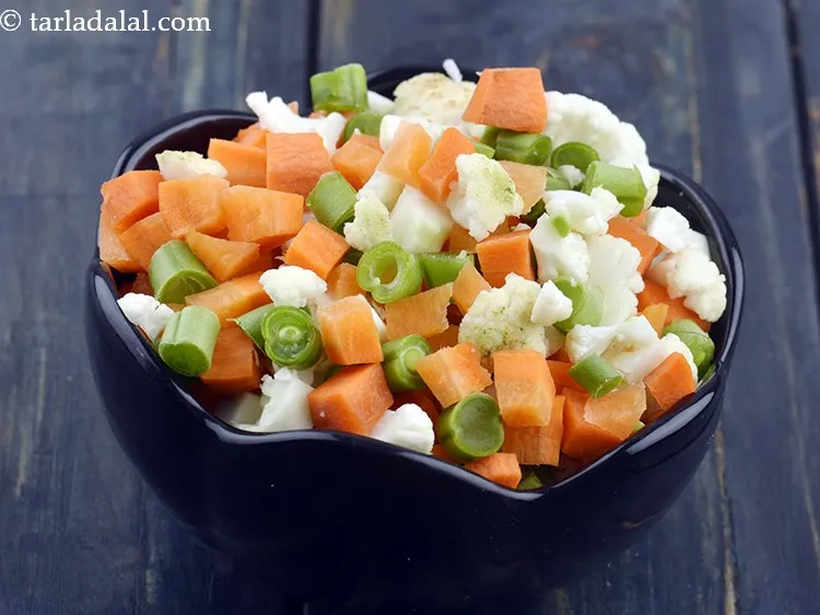 Step 54 – Instead of sauteing the vegetables you can use&nbsp;<a href="https://www.tarladalal.com/glossary-boiled-mixed-vegetable-cubes-2588i">boiled mixed vegetable cubes</a>.