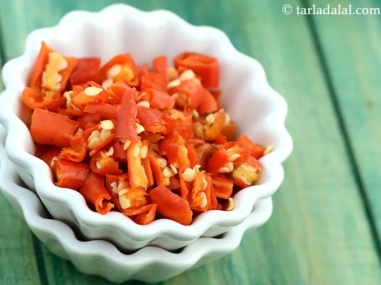 Step 9 – Do not forge to chop the Kashmiri dry red chillies using a scissor.
