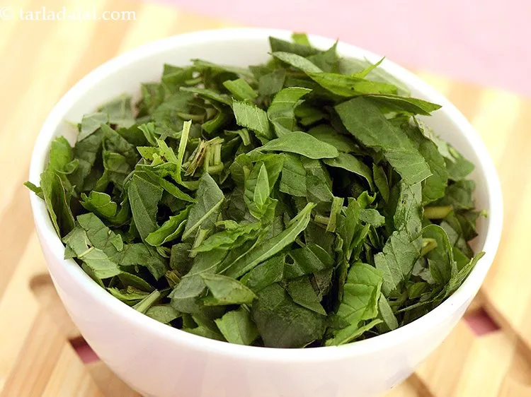 Step 16 – Spinach can be substituted with chopped chawli leaves.