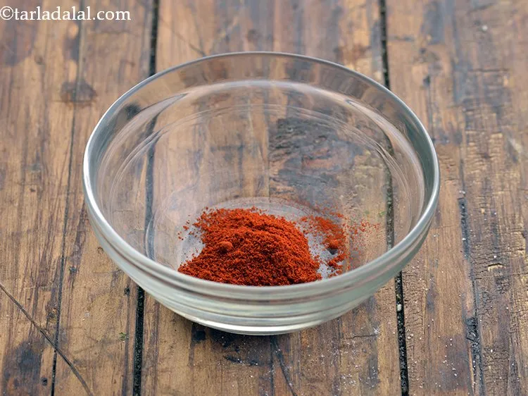 Step 3 – For the spice powder for <strong>Chorafali</strong>, take 1 tsp of chilli powder in a small …