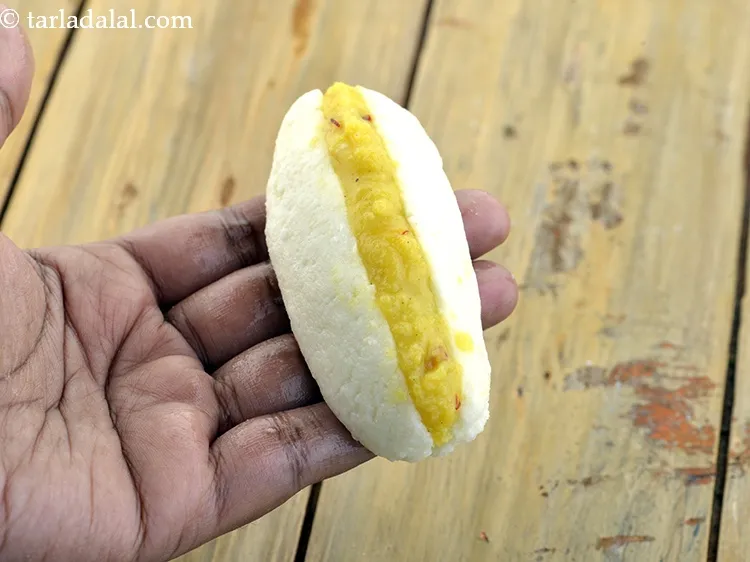 Step 55 – Stuff it with a little prepared mawa stuffing.