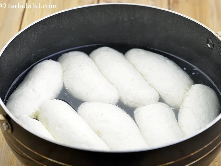 Step 6 – While draining them after cooking, pick gently and add them to the sugar syrup.&nbsp;