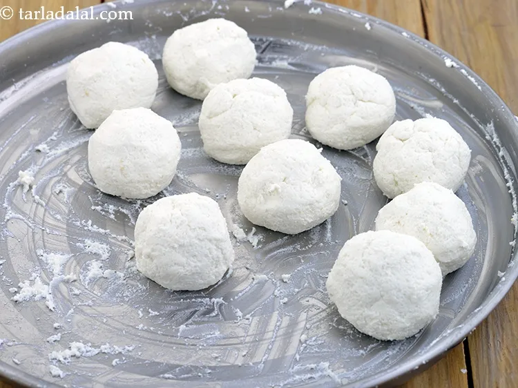 Step 36 – To shape chum chum, divide the paneer mixture into 10 equal portions.