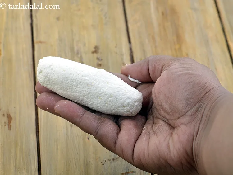 Step 37 – Take one portion between the palms of our hands and shape it into 100 mm. …