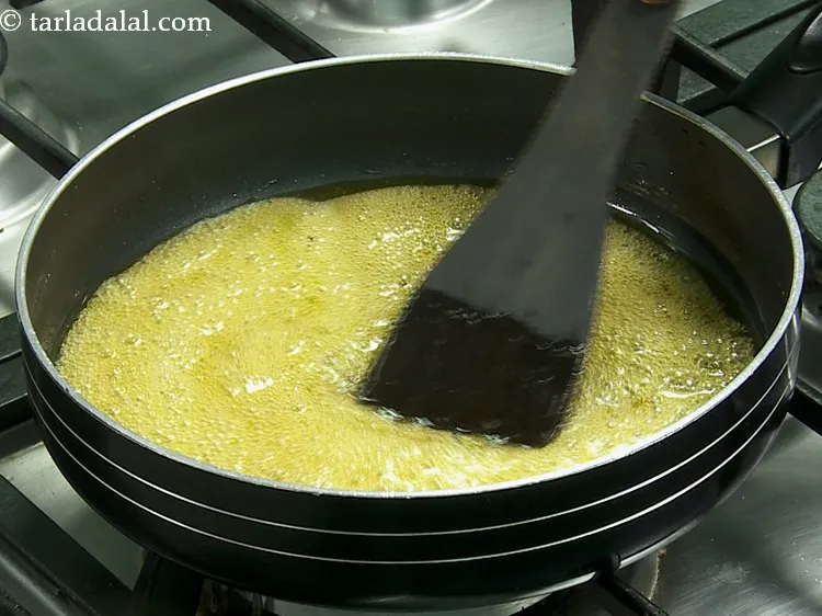 स्टेप 26 – अच्छी तरह मिलाएं और धीमी आंच पर लगातार हिलाते हुए …