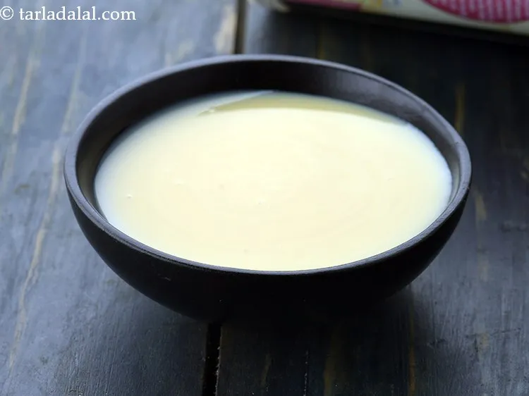 Step 9 – Next add condensed milk. This adds a luscious creamy texture to the <strong>Indian style peach …