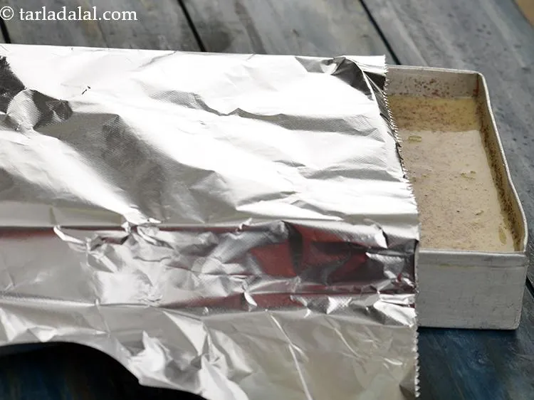 Step 15 – Cover with an aluminium foil and freeze for 6 hours or till semi-set.