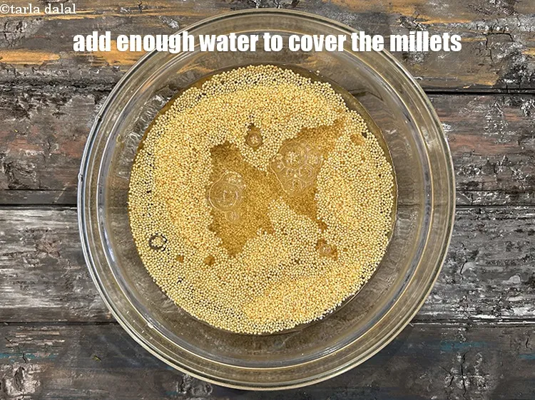 Step 4 – Add&nbsp;enough water to cover the millets.